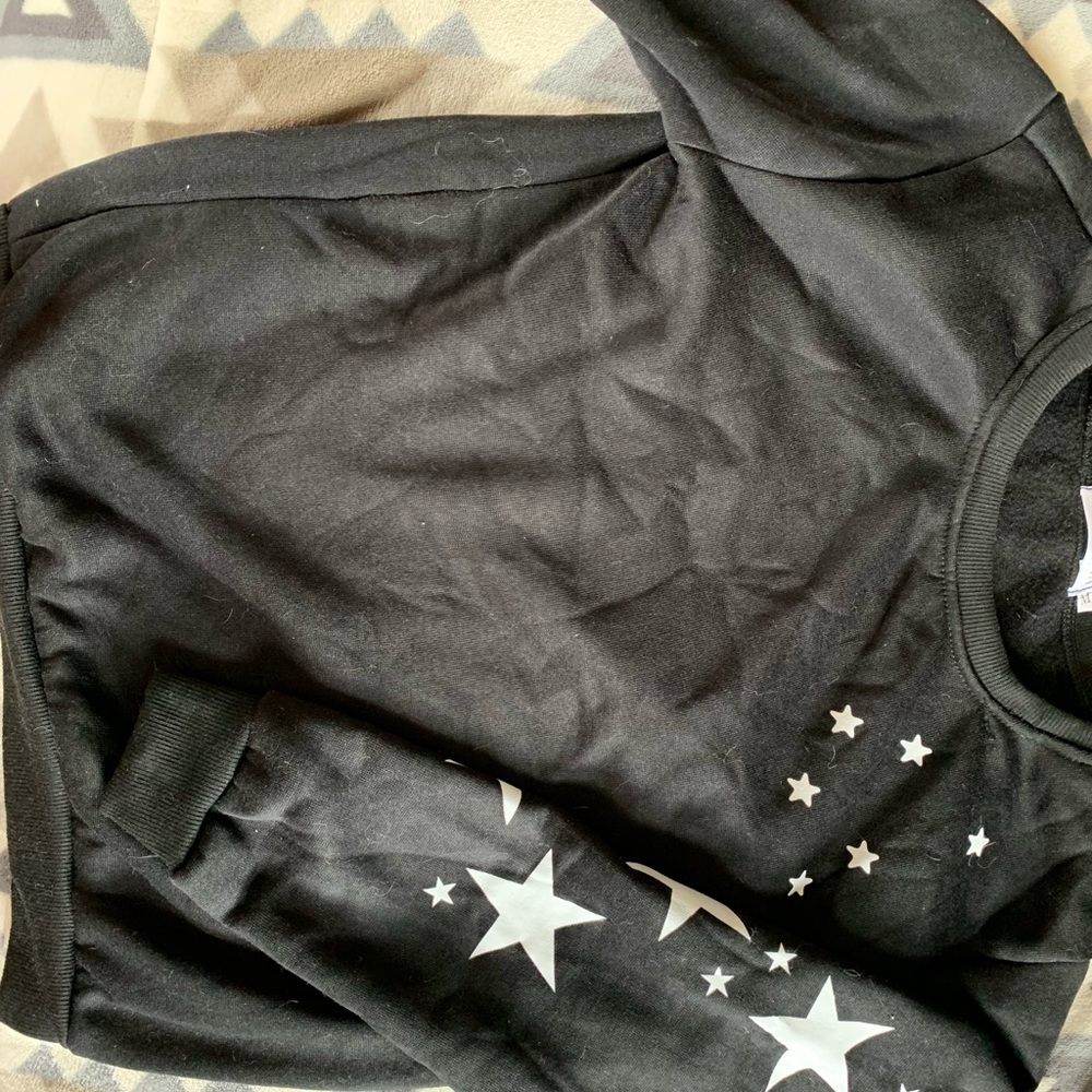 Black sweater with stars